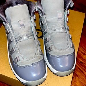 Kids size 1. Cool gray Jordans. Worn, still sturdy and in good condition.